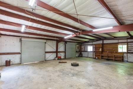 Home on stocked lake and fishing pier with 143 acres - image 26