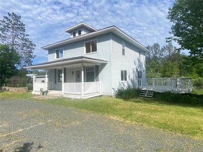 Updated Riverfront Home w/ Garage For Sale in Moose Lake MN - image 1
