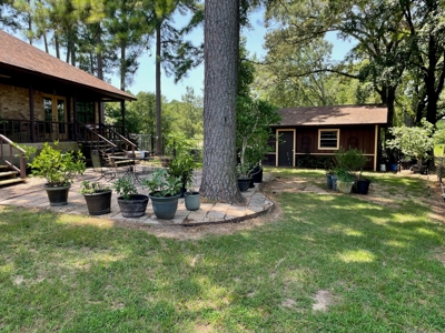 Home in Woodland Lake Estates in Atlanta, TX - image 39