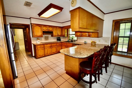 Home in Woodland Lake Estates in Atlanta, TX - image 34