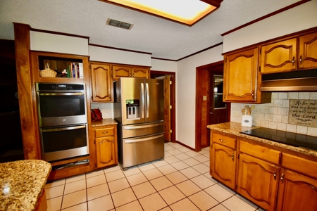 Home in Woodland Lake Estates in Atlanta, TX - image 35