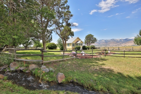 Country Home with Creek, Acreage, Irrigation, Barn, etc. - image 1