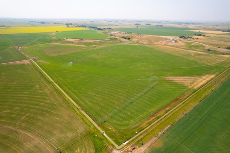265 acres of irrigated hay ground, 2 feedlots & gravel pit - image 18