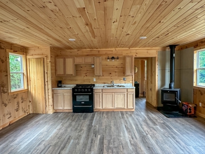 140 Acres, 6 Cabins, Pond, Brooks, and Outdoor Adventures - image 12