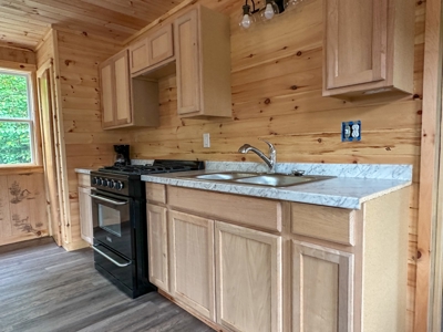 140 Acres, 6 Cabins, Pond, Brooks, and Outdoor Adventures - image 13