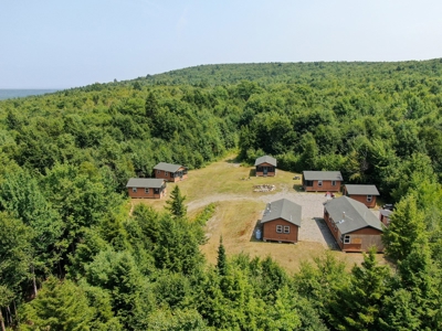 140 Acres, 6 Cabins, Pond, Brooks, and Outdoor Adventures - image 2