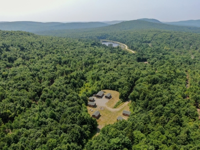 140 Acres, 6 Cabins, Pond, Brooks, and Outdoor Adventures - image 3