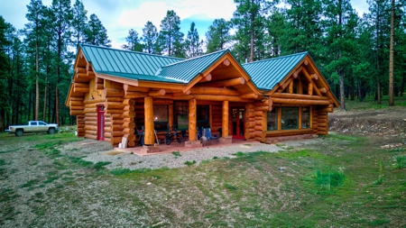 Log Home on Acreage For Sale in Mancos, CO - image 1