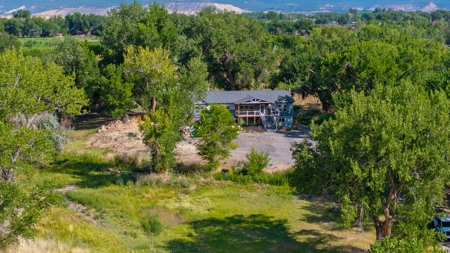 Colorado country home with acreage, 2 living areas, ponds - image 1