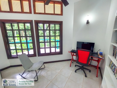 Titled Waterfront Home with Elevated Views and Sea Breezes - image 9