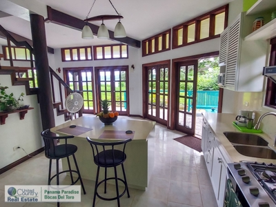Titled Waterfront Home with Elevated Views and Sea Breezes - image 5