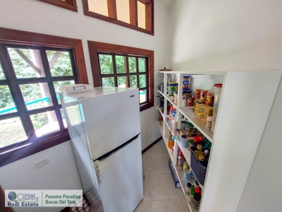 Titled Waterfront Home with Elevated Views and Sea Breezes - image 4