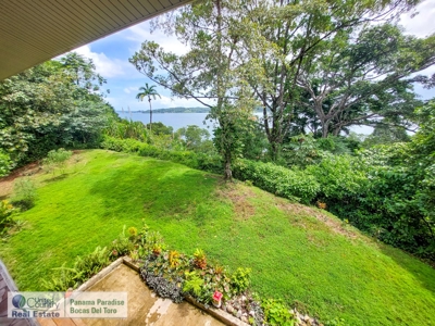 Titled Waterfront Home with Elevated Views and Sea Breezes - image 20