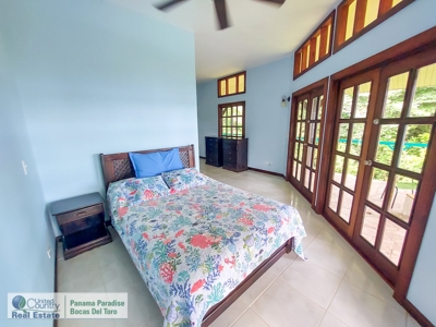 Titled Waterfront Home with Elevated Views and Sea Breezes - image 13