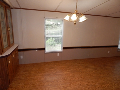 1997 Clayton Mobile Home on .48 Acre with a Stream! - image 17