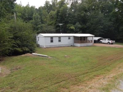 1997 Clayton Mobile Home on .48 Acre with a Stream! - image 2