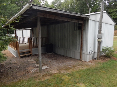 1997 Clayton Mobile Home on .48 Acre with a Stream! - image 4