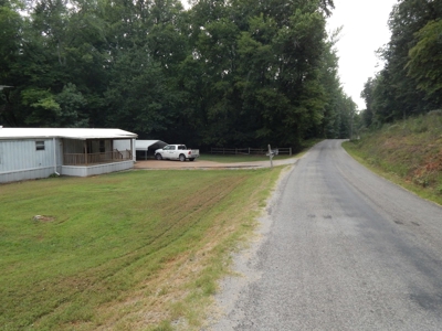1997 Clayton Mobile Home on .48 Acre with a Stream! - image 3