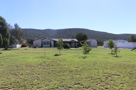 Off-grid Home with Guest Quarters on a Paved Rd for Sale - image 1