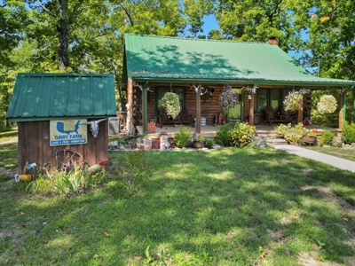 Bull Shoals Lake Front Log Cabin on 77 Acres in Pontiac, MO - image 1