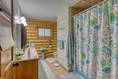Gorgeous Custom Log Cabin Home For Sale - image 39