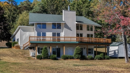 Home with Waterfront Access Lake Fifteen for Sale Atlanta MI - image 1