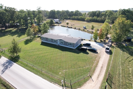 Country Home With A Pond And Shop - image 1