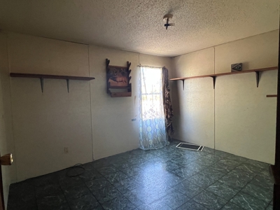 Cozy 2-Bedroom Mobile Home on 5.34 +/- Acres - image 6