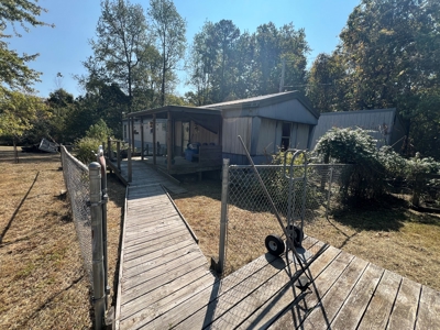 Cozy 2-Bedroom Mobile Home on 5.34 +/- Acres - image 2