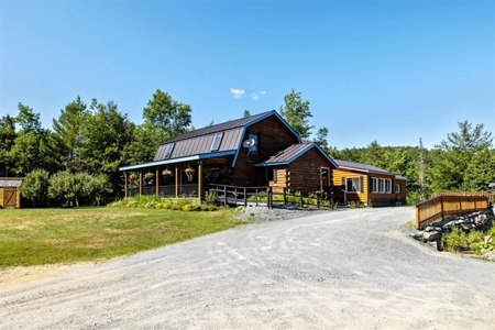 Log Cabin with a Beautiful Setting! - image 9