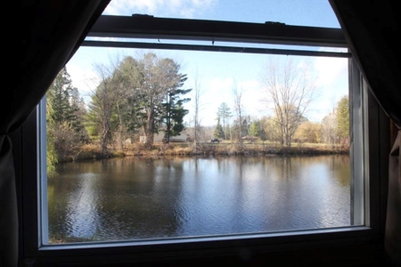 Waterfront Home with Pond Hillman MI near Thunder Bay River - image 3