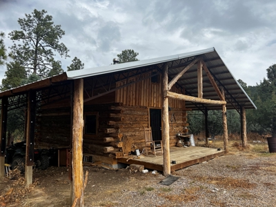 Rustic Log Cabin with Outbuilding with no CCR's - image 3