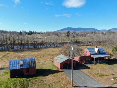 Classic Maine Farmhouse with Riverfront - image 1