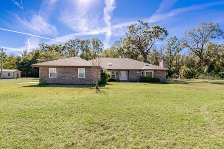 Online Realty Auction High Springs, FL Home on 11+ Acres - image 2