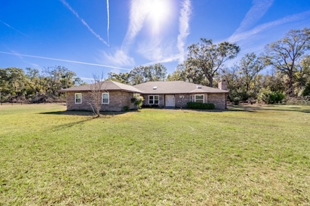 Online Realty Auction High Springs, FL Home on 11+ Acres - image 1