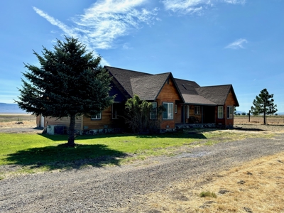 2070 sq. ft. home 3 bed/2bath with 12+/- acres with 2 shops - image 1