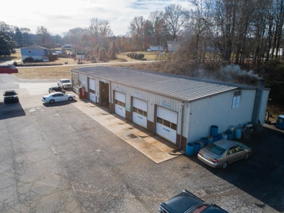 For Sale: Income-Producing Garage/Warehouse on 1.12+/- Acres - image 2