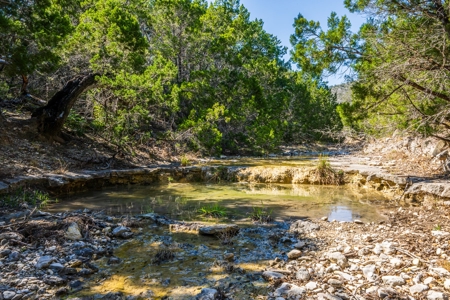 HIDDEN SPRINGS RANCH  676ac in Concan, Texas - image 1
