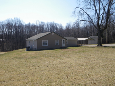 Evansville West-side home with acreage - image 1