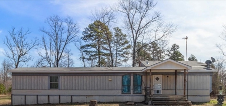 Country Retreat with Abundant Storage and Versatile Outbuildings - image 2