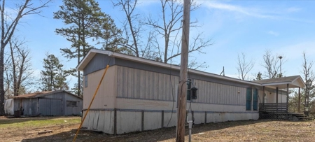 Country Retreat with Abundant Storage and Versatile Outbuildings - image 3