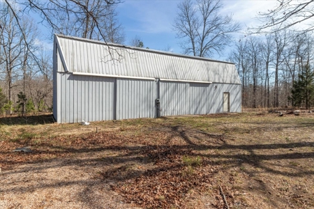 Country Retreat with Abundant Storage and Versatile Outbuildings - image 4