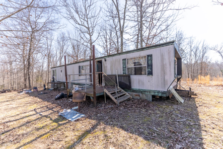 Fixer Upper Farmhouse and Acreage with Outbuildings in the Ozarks - image 13