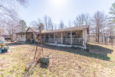Fixer Upper Farmhouse and Acreage with Outbuildings in the Ozarks - image 4