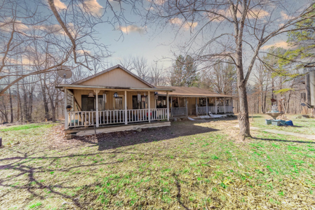 Fixer Upper Farmhouse and Acreage with Outbuildings in the Ozarks - image 2