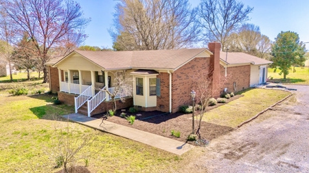 Hobby Farm for Sale featuring Brick Home w/ Barn & Fenced Pasture in Newbern, TN - image 2