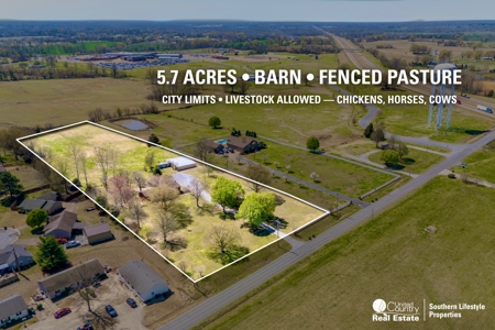Hobby Farm for Sale featuring Brick Home w/ Barn & Fenced Pasture in Newbern, TN - image 1