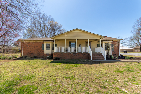 Hobby Farm for Sale featuring Brick Home w/ Barn & Fenced Pasture in Newbern, TN - image 4
