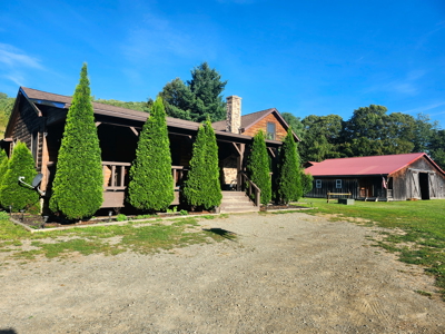 Log Home with Equine Barn and Arenas - image 45