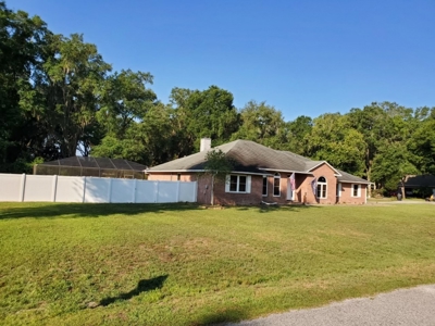 All brick 4 bed/2.5 bath home w/pool in desired neighborhood - image 2